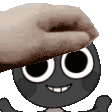 a person is petting a cartoon character on the head .