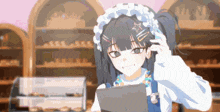 a girl in a maid costume is standing in front of a bakery holding a tablet .
