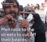 newsmen took to thestreets to cut offtheir beards. mick foley person human face