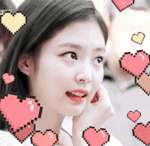 a pixelated image of a woman with hearts around her