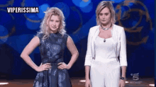 two women are standing next to each other and the words viperissima are on the screen