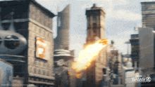 a poster for fantastic four shows a city with buildings and a fire coming out of a building