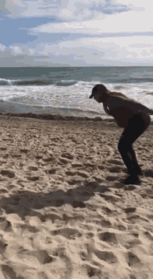 jump jumping beach sand waves