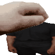 a pixelated image of a hand holding a black object