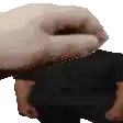 a pixelated image of a hand holding a black object