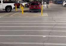 a red suv is parked in a parking lot with a license plate that says ' jcl ' on it
