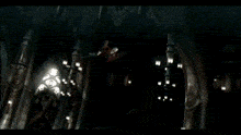 a person in a red cape is standing in a room