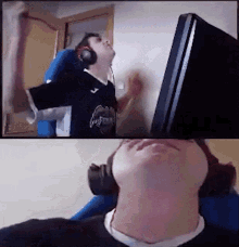a man wearing headphones is sitting in front of a computer screen