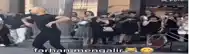 a man is dancing in front of a crowd with the words farhan mengalir written on the bottom .