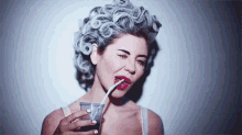 Marina And The Diamonds Sipping GIF - Marina And The Diamonds Sipping Drinking GIFs