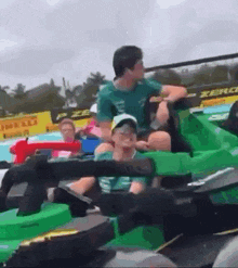 a group of people are riding a roller coaster that says zero