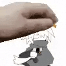 a hand is holding a piece of cheese over a cartoon character 's head .