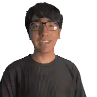 a man with glasses and a caleb shirt on