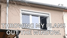 a picture of a house with the words throwing my plans out the window below it