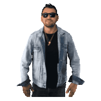 a man wearing sunglasses and a denim jacket