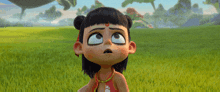 a cartoon girl is standing in a grassy field looking up at something .