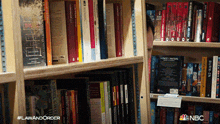 a book shelf with a sign that says #lawanorder