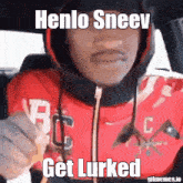 a man in a red hoodie with the words henlo sneev get lurked on it