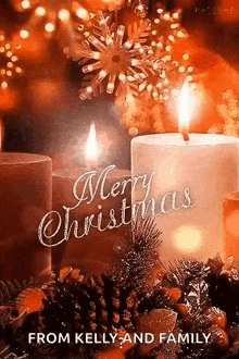 a merry christmas greeting card with candles and pine cones .