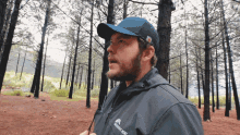 a man wearing a jacket that says comfort 100