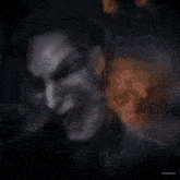 a collage of images of a man with a scary face on a dark background