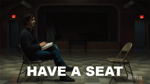 Have A Seat Father Paul GIF - Have A Seat Father Paul Hamish Linklater GIFs