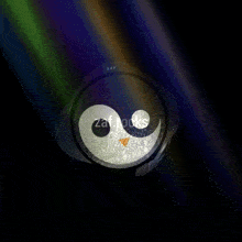 a picture of a penguin wearing headphones that says zap on the bottom