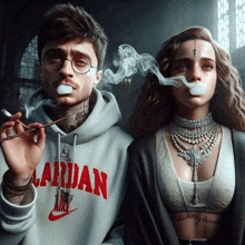 a man wearing a hoodie with the word jordan on it smoking a cigarette next to a woman