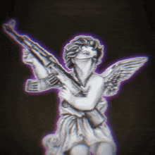 a statue of a woman with wings holding a rifle