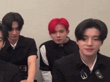 a man with red hair has a belt around his waist