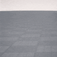 a black and white image of a person walking