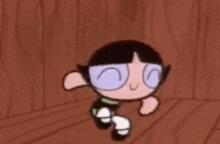 buttercup from the powerpuff girls is dancing on a wooden floor in a room .
