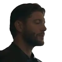 a man with his eyes closed has the word right written on his face