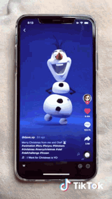 a cell phone displays a tiktok video of olaf