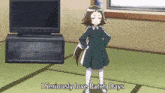 a girl in a green dress is standing in front of a television in a living room .