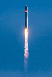 a rocket with the letter a on it flies through the air