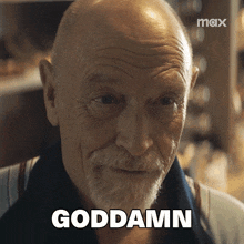 a man with a beard says goddamn in front of his face