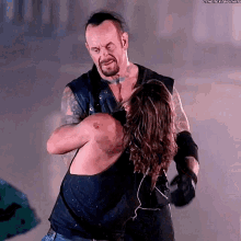 The Undertaker Hug GIF - The Undertaker Hug Hugs GIFs