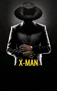 a blurred image of a man with the word x-man in yellow