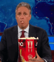 Jon Stewart GIF - Jonstewart Popcorn Popcornday GIFs