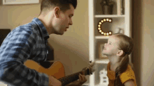Play Guitar Claire Crosby GIF - Play Guitar Claire Crosby Claire And The Crosbys GIFs