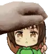 a person is petting a cartoon character 's head with a brush .
