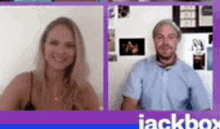a man and a woman are sitting in front of a purple background .