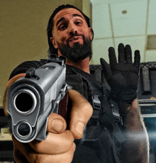 Seth Rollins Gun GIF