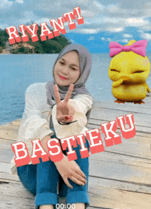 a woman sitting on a dock with the name riyanti written on her