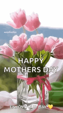 a vase filled with pink flowers with the words `` happy mother 's day enjoy your day '' .