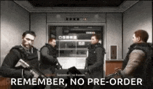 a group of men standing next to each other in an elevator with guns .