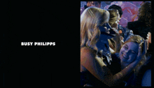 a woman is hugging another woman and the name tina fey is on the bottom