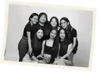 a group of young women posing for a photo