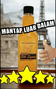 a bottle of jamu cik lynn is sitting on a table
